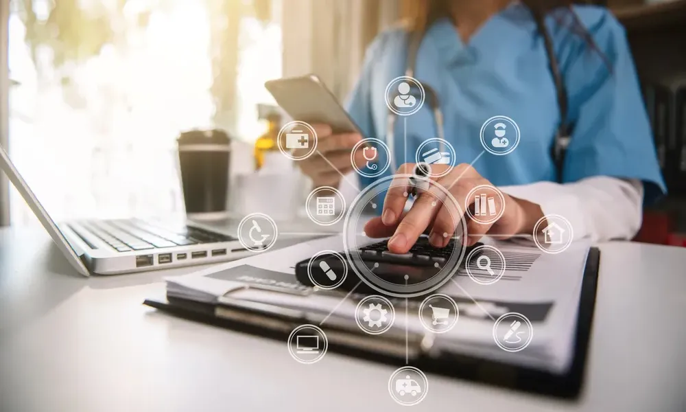Medical billing specialist performing insurance verification and prior authorization services for healthcare providers using digital healthcare systems